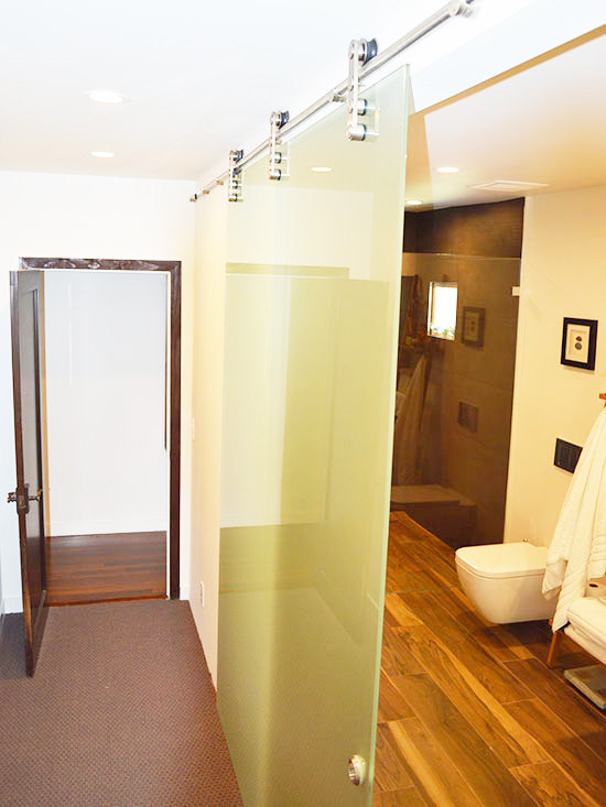 glass barn door, walk in shower, clean lines, contemporary bathroom, master suite remodel
